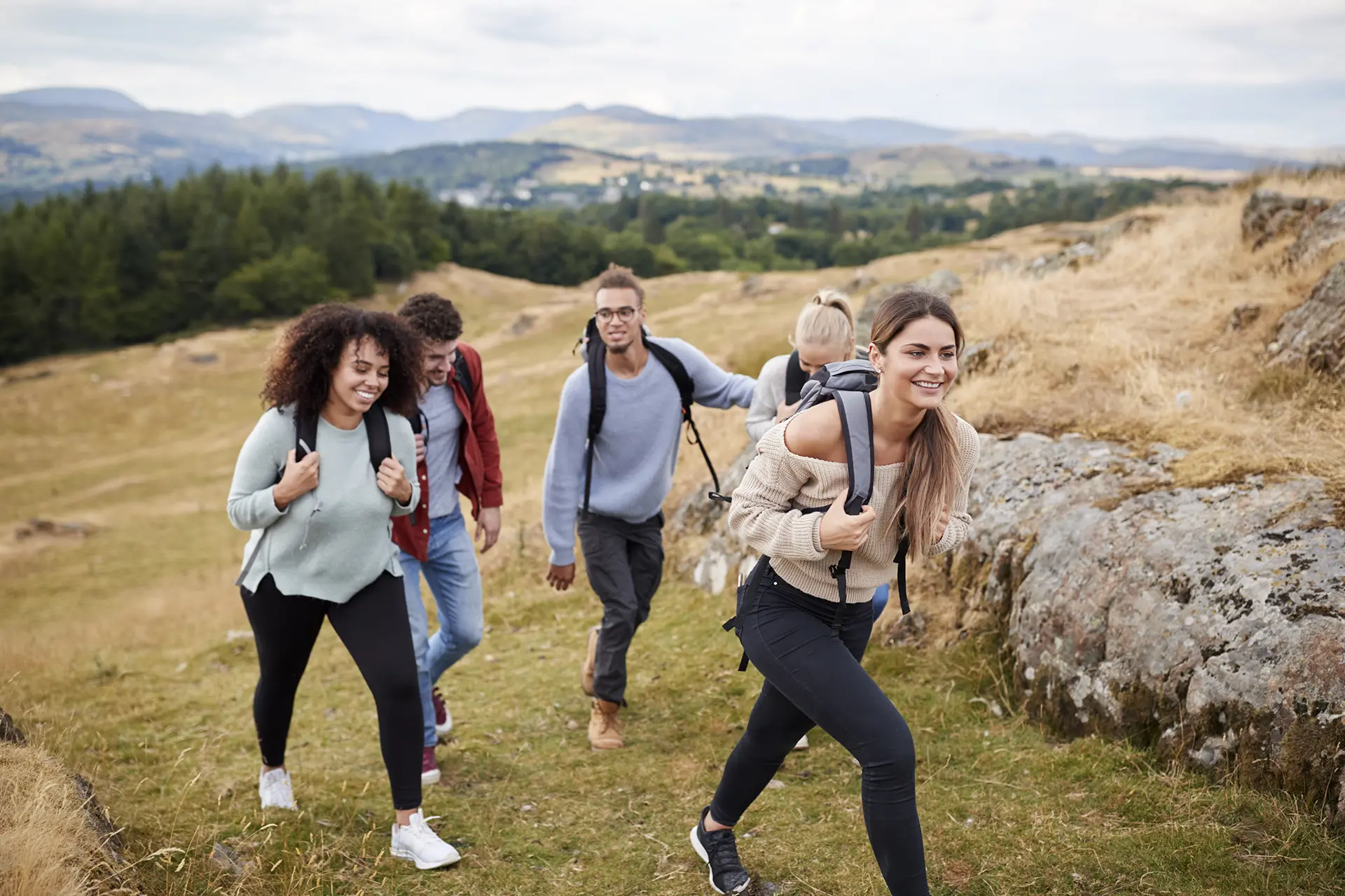 A small group of students on a nature walk